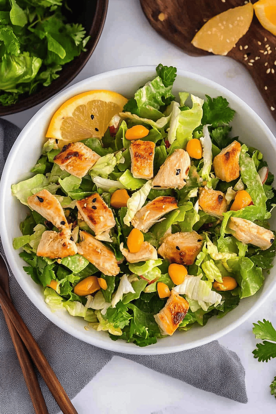 Asian Sesame Chicken Salad Recipe slice on plate showing perfect texture and swirl pattern