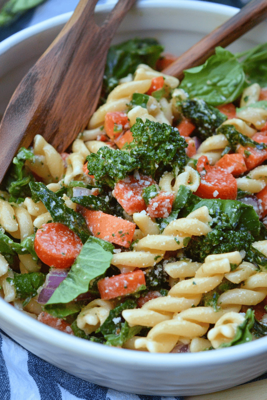 Balsamic pasta salad ingredients organized and measured on kitchen counter