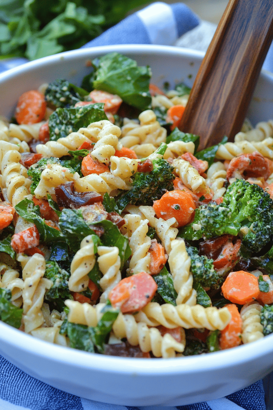 Balsamic pasta salad slice on plate showing perfect texture and swirl pattern