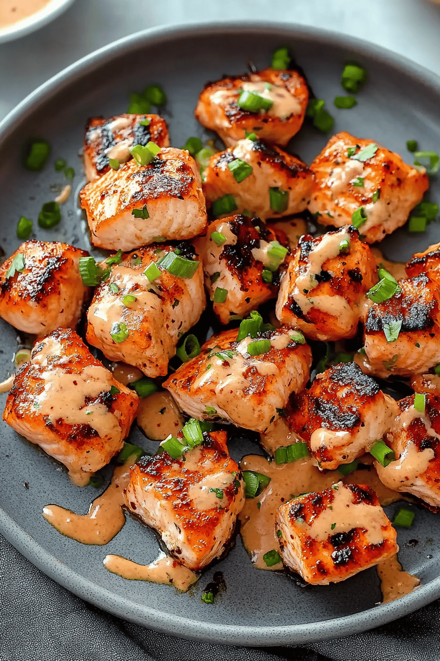 Bang Bang Salmon Recipe slice on plate showing perfect texture and swirl pattern