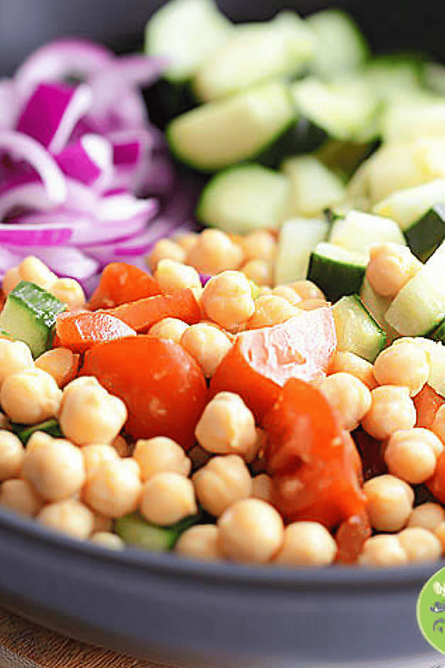 Chickpea Salad Recipe ingredients organized and measured on kitchen counter
