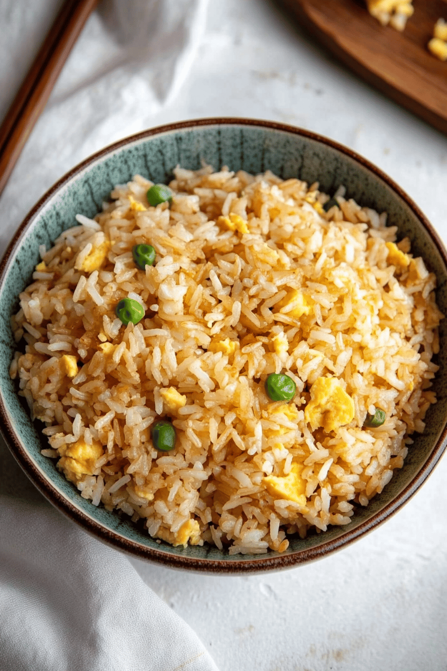 egg fried rice slice on plate showing perfect texture and swirl pattern