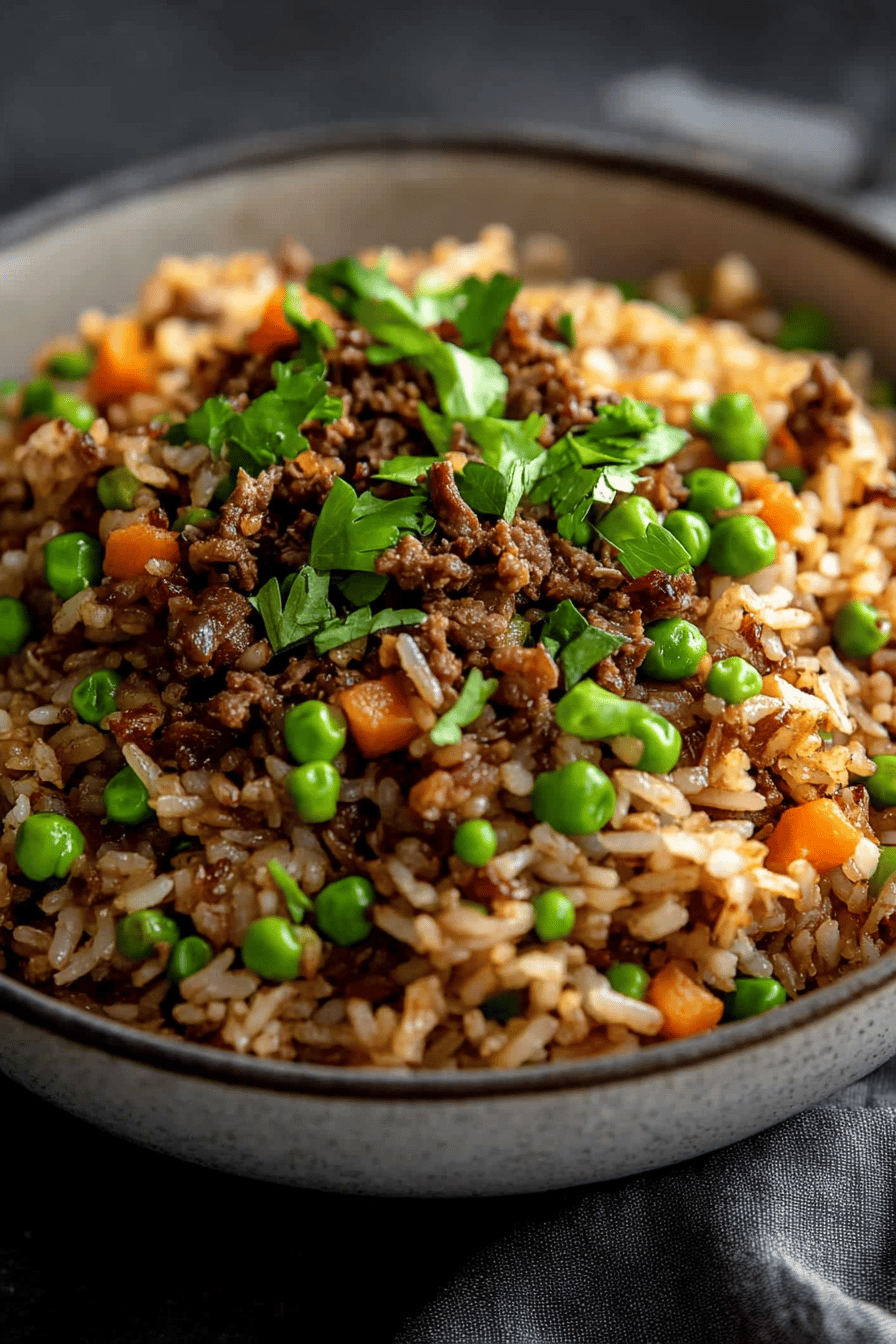 minced beef fried rice slice on plate showing perfect texture and swirl pattern