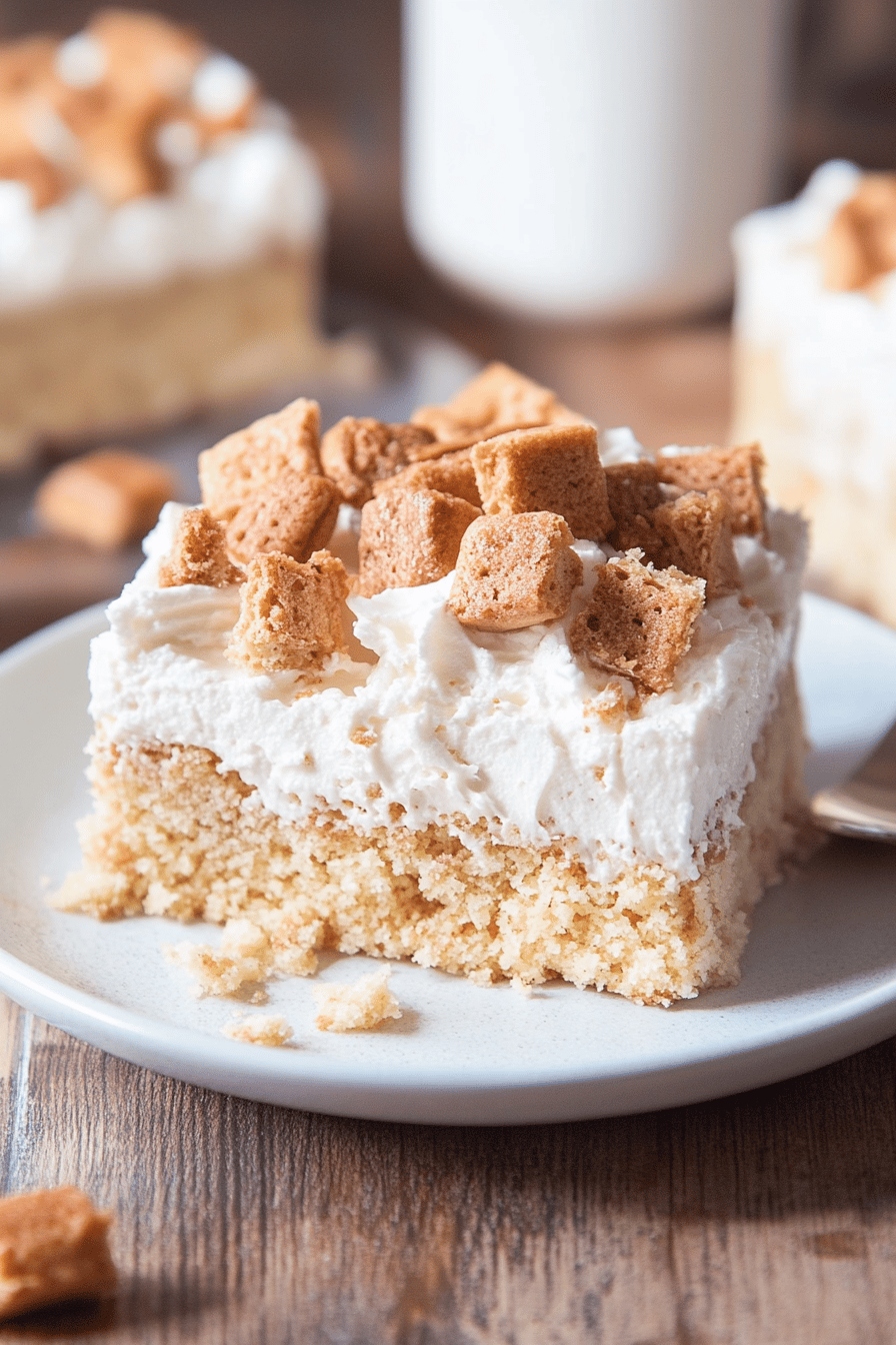 poke cake slice on plate showing perfect texture and swirl pattern