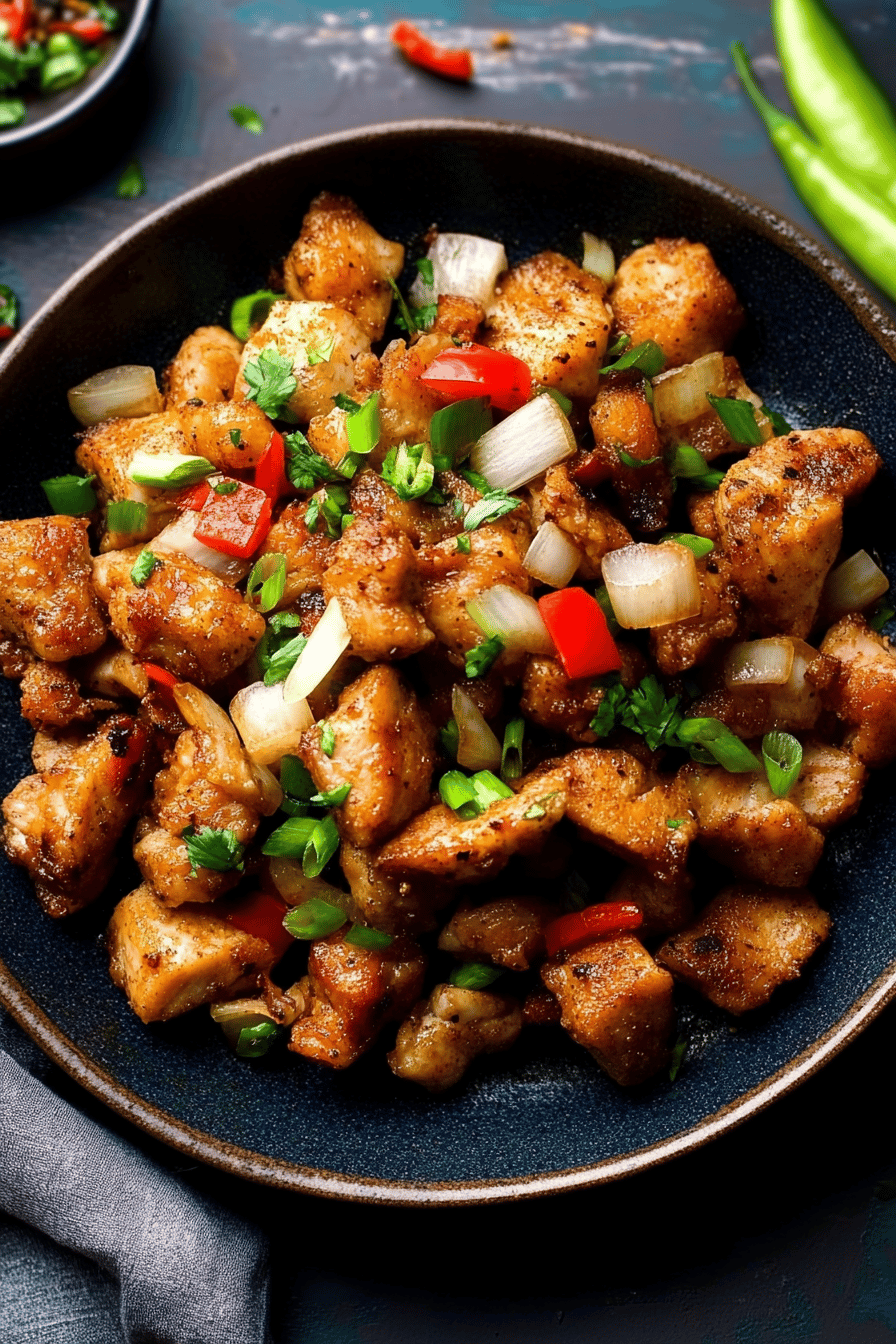 Salt and pepper chicken ingredients organized and measured on kitchen counter