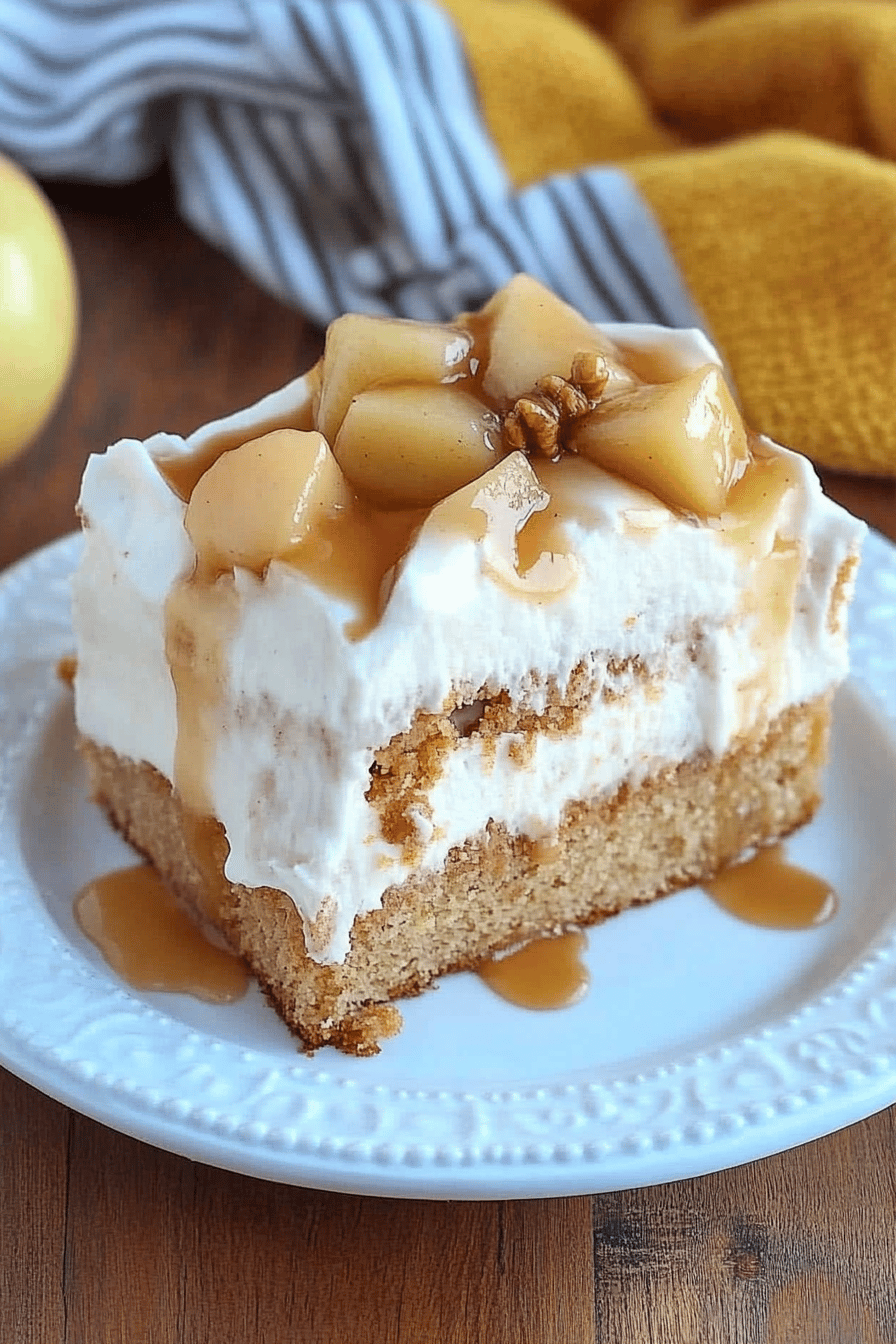 apple spice poke cake slice on plate showing perfect texture and swirl pattern