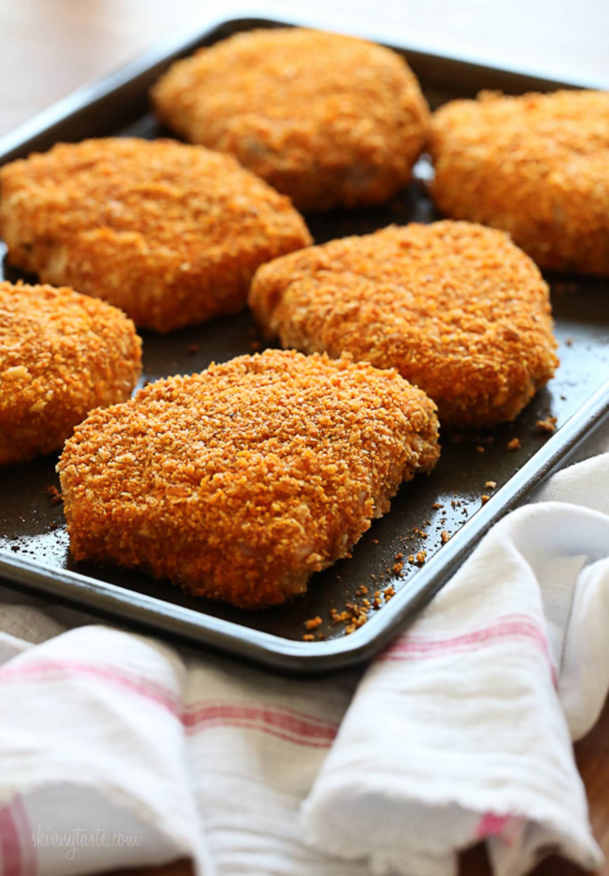 Breaded Pork Chops beautifully presented from an overhead angle
