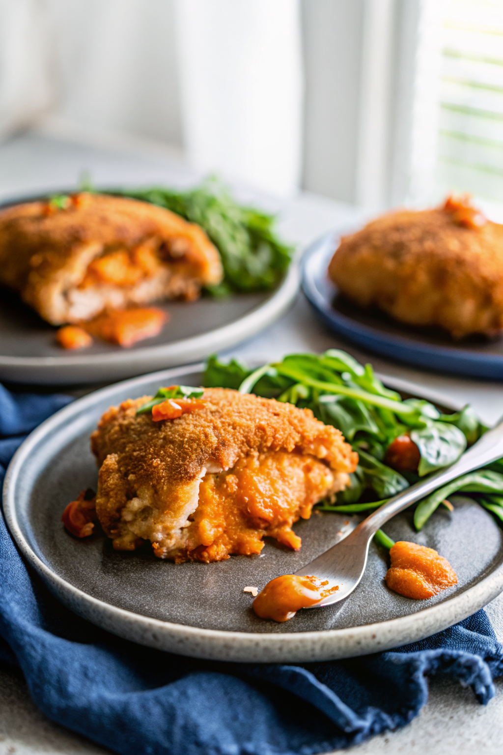 Stuffed Buffalo Chicken slice on plate showing perfect texture and swirl pattern